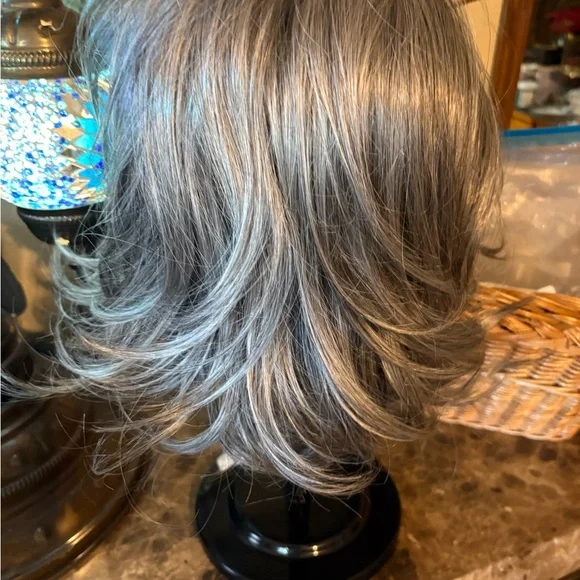 Godiva’s Secret Wigs Monroe style that is a Elegant Silver Gray Women's Wig. - Picture 3 of 3